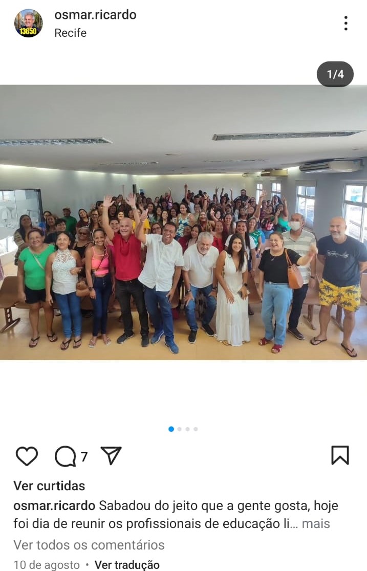 Imagem capturada de uma postagem do perfil de instagram do vereador Osmar Ricardo, com dezenas de pessoas posando para a câmera em uma salão fechado. A postagem foi feita no dia 10 de agosto.