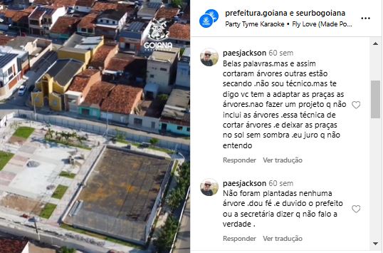 Publicação do instagram com visão aérea de uma praça em construção ou reforma. Nota-se áreas de concreto, algumas árvores e espaços ainda em obras. O logotipo da Prefeitura de Goiânia aparece no canto superior esquerdo. Comentários: Usuário: paesjackson Texto: Belas pavimentações e assim cortaram árvores, outras estão secando. Não sou técnico, mas te digo: vem te adaptar às praças as árvores. Não fazer um projeto e não incluir as árvores não é técnico. E cortar árvores de áreas onde o sol não tem sombra eu juro que não entendo. Usuário: paesjackson (outro comentário): Texto: Não foram plantadas nenhuma árvore nova. Eu duvido o prefeito ou a secretaria dizer que não faça a verdade.